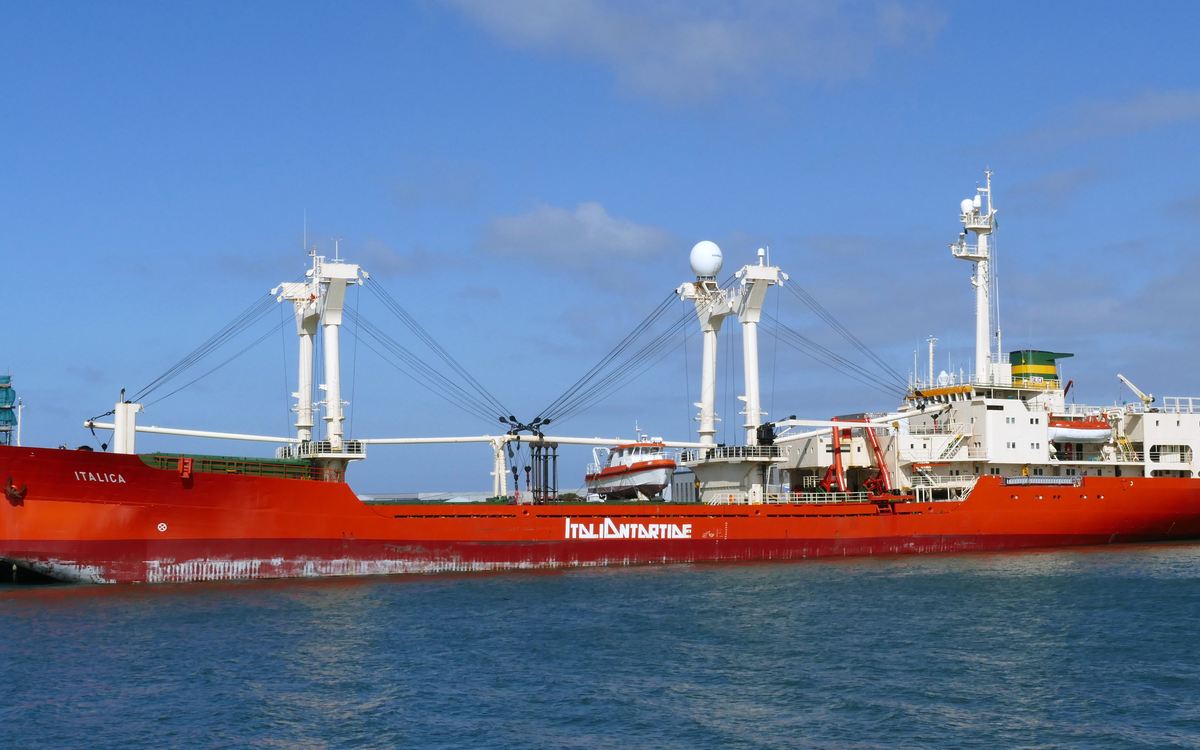 A general cargo vessel with deck cranes