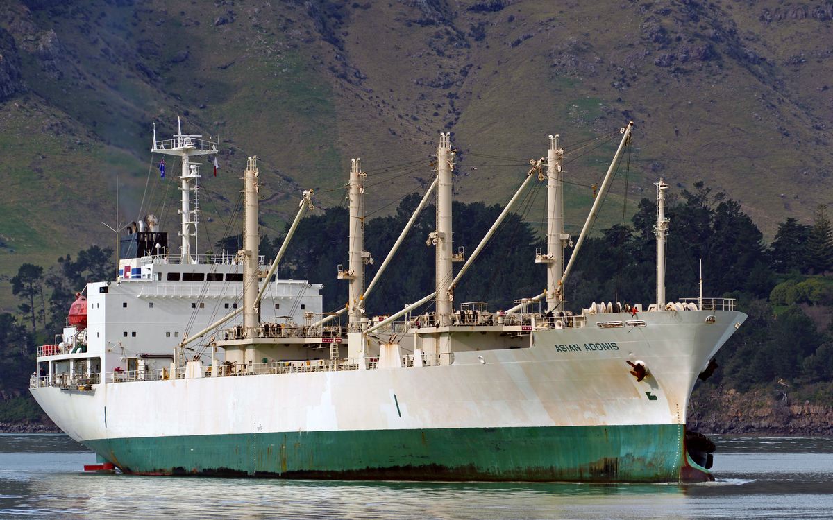 A refrigerated cargo ship under way